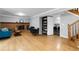 Inviting living room with a fireplace and a doorway leading to the laundry area at 1768 E Jamison Ave, Centennial, CO 80122