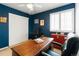 Inviting home office with an adjustable desk and natural light at 1768 E Jamison Ave, Centennial, CO 80122