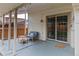 Covered patio with seating, adjacent to the home, offers a relaxing outdoor space at 1768 E Jamison Ave, Centennial, CO 80122