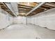 Unfinished basement space ready for customization and ample storage at 8787 Whiteclover St, Littleton, CO 80125