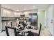 Bright kitchen features stainless appliances, sleek countertops, and modern fixtures at 272 Balsam Ave, Brighton, CO 80601