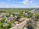 Aerial view of a single-Gathering home showcasing the fenced yard and detached garage at 1101 Spruce St, Louisville, CO 80027