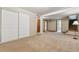 Spacious finished basement with stairs, large closet, and neutral carpeting at 1101 Spruce St, Louisville, CO 80027