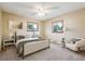 Cozy bedroom with neutral walls, carpeted floor, and two windows for ample natural light at 1101 Spruce St, Louisville, CO 80027