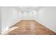 Finished basement with wood flooring and ample space at 1420 Dexter St, Denver, CO 80220