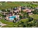 Community clubhouse with a resort-style pool, outdoor seating, and well-maintained grounds at 2276 S Norse St, Lakewood, CO 80228
