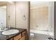 Well-lit bathroom featuring a vanity and a shower-tub combination at 2276 S Norse St, Lakewood, CO 80228