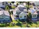 Charming two-story home with solar panels, landscaped yard, and a welcoming front porch at 2276 S Norse St, Lakewood, CO 80228