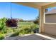 Charming patio featuring views, landscaping and hanging flower baskets at 2276 S Norse St, Lakewood, CO 80228