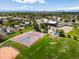 Overhead aerial showcasing sports courts, skate park, and open grassy space within a neighborhood at 2006 E 97Th Ave, Thornton, CO 80229