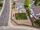 Aerial view of a home's backyard with a patio, garden, and well-maintained landscaping at 2006 E 97Th Ave, Thornton, CO 80229