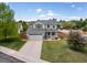 Beautiful two-story home featuring a spacious front yard and a cozy front porch for relaxing evenings at 2006 E 97Th Ave, Thornton, CO 80229