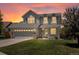 Charming two-story home with a well-manicured lawn and a two-car garage, perfect for families at 2006 E 97Th Ave, Thornton, CO 80229