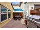 Back patio featuring a dining table and BBQ grill perfect for outdoor entertainment at 9654 Martin Luther King Jr Blvd, Denver, CO 80238