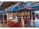 Vibrant marketplace with diverse food vendors and dining areas for a communal experience at 9654 Martin Luther King Jr Blvd, Denver, CO 80238