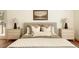 Cozy bedroom showcases decorative lamps, accent pillows, and hardwood floors at 24 Spyglass Dr, Littleton, CO 80123