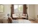 Bright bedroom features neutral walls, stylish decor, and a comfortable setting at 24 Spyglass Dr, Littleton, CO 80123