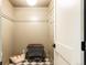Mud room offers black and white checkered flooring, and gray accent wall at 24 Spyglass Dr, Littleton, CO 80123