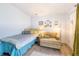 Comfortable bedroom with wood floors, cozy furniture, and inviting decor at 919 S Dawson Way # 17, Aurora, CO 80012