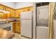 Efficient kitchen with appliances, cabinetry, and countertop space at 919 S Dawson Way # 17, Aurora, CO 80012