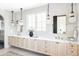 Spacious bathroom with double vanity, decorative mirrors, and pendant lighting at 1968 S Washington St, Denver, CO 80210