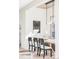 Elegant dining area with modern light fixture and comfortable seating at 1968 S Washington St, Denver, CO 80210