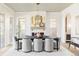 Formal dining room features a fireplace, large windows, and seating for eight at 1968 S Washington St, Denver, CO 80210