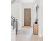 Bright entryway with wood floors, light walls, and stylish decor at 1968 S Washington St, Denver, CO 80210