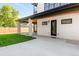 Backyard featuring a covered patio, concrete, and a well-maintained lawn with a wood fence at 4452 Xavier St, Denver, CO 80212