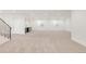 Unfinished basement with carpet, bar area, and multiple windows provides ample space at 4452 Xavier St, Denver, CO 80212