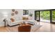 Cozy living room with a comfortable sectional sofa, stylish decor, and a balcony view at 4452 Xavier St, Denver, CO 80212