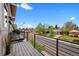 Balcony with views of neighborhood homes and street at 3480 E 31St Ave, Denver, CO 80205