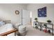 Cozy bedroom with daybed, stylish decor, and interior access door at 3480 E 31St Ave, Denver, CO 80205