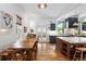 Open concept kitchen and dining area, perfect for entertaining guests and Gathering at 3424 W 31St Ave, Denver, CO 80211