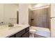 Bathroom with tub and shower combo with single vanity and great natural light at 3979 Descent St, Castle Rock, CO 80108