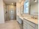 Modern bathroom with double vanity, walk-in shower, and contemporary fixtures at 3979 Descent St, Castle Rock, CO 80108