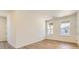 Bright bedroom with hardwood floors, two windows and closet offers versatile space at 3979 Descent St, Castle Rock, CO 80108