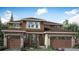 Charming two-story home with a symmetrical design, stone accents, and a welcoming front porch at 3979 Descent St, Castle Rock, CO 80108