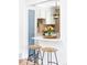 Stylish kitchen with modern appliances, breakfast bar seating and decor at 2313 S Race St # A, Denver, CO 80210