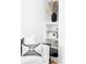 Cozy living room corner featuring stylish decor, bookshelf, and comfortable seating perfect for relaxing and reading at 2313 S Race St # A, Denver, CO 80210