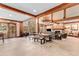 Large community lounge featuring stone fireplace, timber beams, and comfortable seating at 50 Mountain Thunder Dr # 1212, Breckenridge, CO 80424