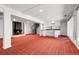 Finished basement featuring a stone fireplace, spiral staircase, and wet bar at 150 Soda Creek Rd, Evergreen, CO 80439