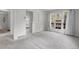 Bedroom with a large doors leading to a patio and light colored carpet flooring at 150 Soda Creek Rd, Evergreen, CO 80439