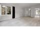 A bright living room with a large window and neutral colored carpet flooring at 150 Soda Creek Rd, Evergreen, CO 80439