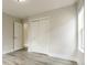 Bedroom with a closet, neutral colors, and a window at 405 Cypress St, Broomfield, CO 80020