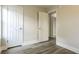 Bedroom with gray flooring, neutral walls, and white trim at 405 Cypress St, Broomfield, CO 80020