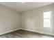 Bedroom featuring neutral color palette and a window with natural light at 405 Cypress St, Broomfield, CO 80020