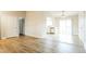 Open living area transitioning to kitchen with sliding doors at 405 Cypress St, Broomfield, CO 80020