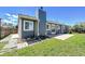 The home has a great backyard with a nice patio and a well-maintained lawn area at 19155 E Kansas Dr, Aurora, CO 80017
