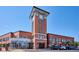 Commercial building with clock tower, Jimmy John's, and other storefronts at 9652 Cove Creek Dr, Highlands Ranch, CO 80129